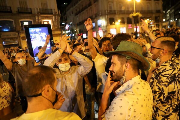 People gathered at Puerta del Sol square in Madrid on Sunday to celebrate the end of the state of emergency decreed by the Spanish government. 
