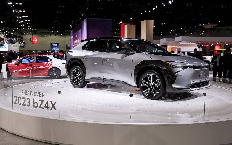 Toyota rolls out first battery electric car in cautious debut as rivals go full-throttle