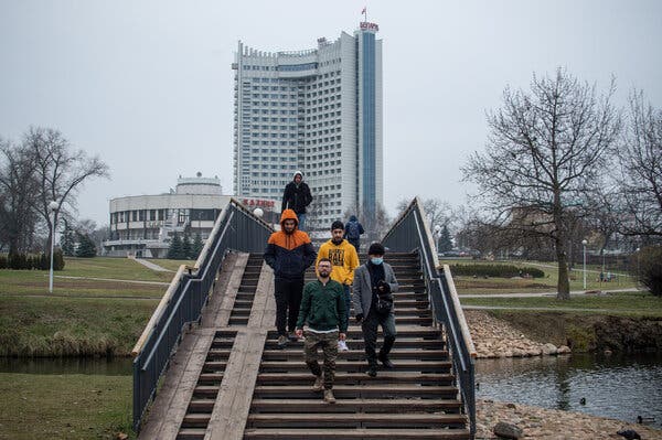 Migrants near a hotel on Wednesday in Minsk, Belarus.