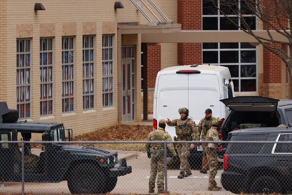 SWAT team members near Congregation Beth Israel in Colleyville, Texas, on Saturday.
