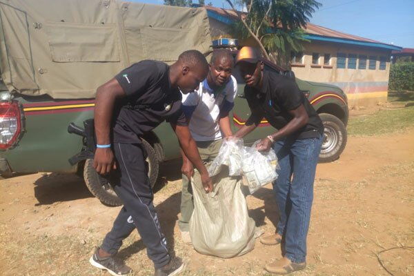 Officers Busted Smuggling Alcohol From Uganda in Police Vehicle