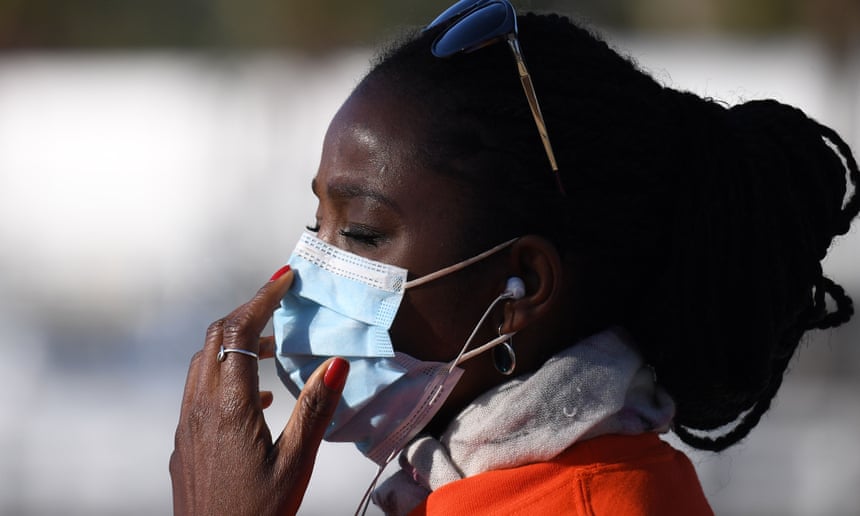 Americans Urged To Wear Face-masks When Going Outside Fearing Covid-19 Maybe Spreading By Normal Breathing