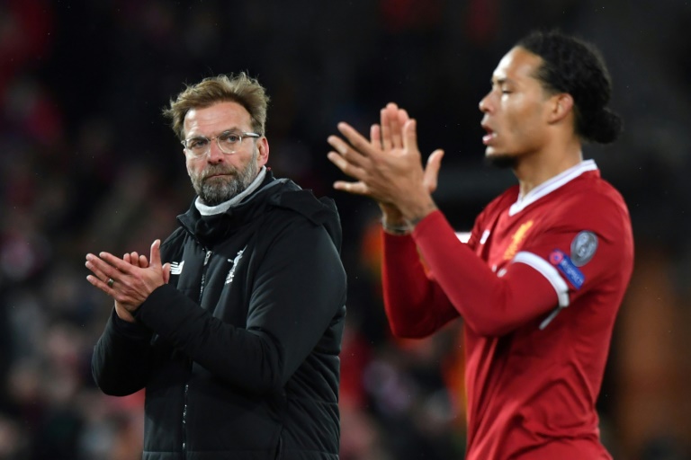 Van Dijk is man of the moment as Liverpool eye home straight