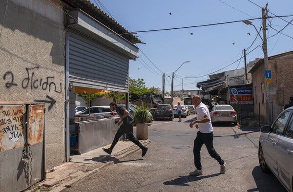 Running for shelter in Tel Aviv last week as Hamas fired rockets from Gaza.