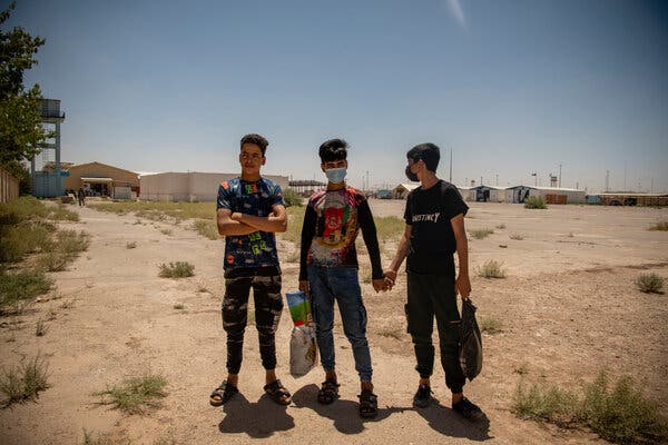 Karim (left), 15, Gul Ahmad (center), 14, and Saeed, 15, grew up together in Kharchan, a village in the province of Herat. They were determined to leave home and find better lives.