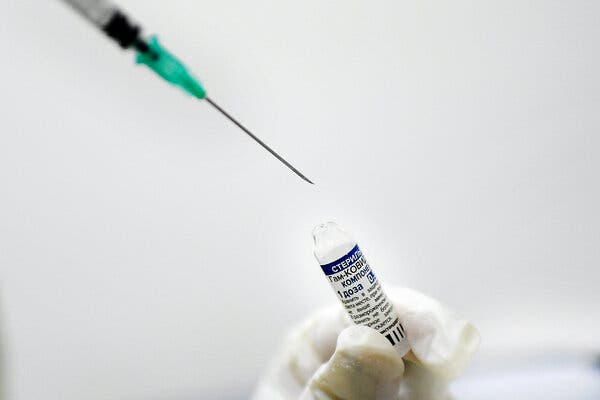 A doctor preparing a dose of the Sputnik V Covid-19 vaccine.