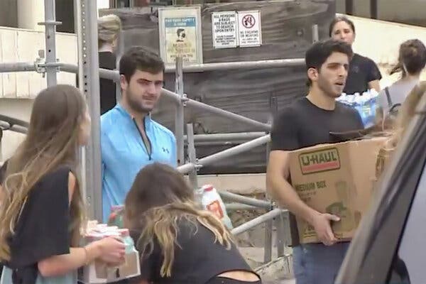 Volunteers in Bal Harbour, Fla. assisting with donations for The Shul synagogue and the survivors and family members of the Champlain Towers building collapse on Thursday. Officials reported more than a dozen members of the synagogue are among the missing.