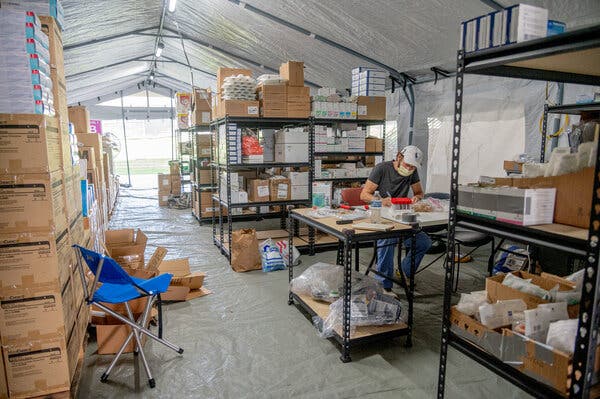 Frank Welch, medical logistics, working inside the field hospital in the parking garage at UMMC in Jackson, Miss.