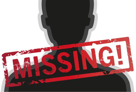 A poster indicating a missing person.