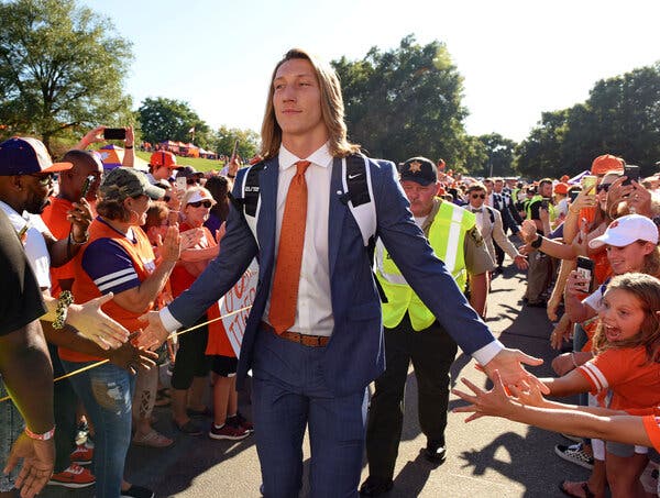 Clemson’s Trevor Lawrence is expected to be the No. 1 overall pick but will not attend the N.F.L. draft in person.