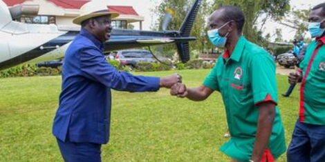 ODM leader Raila Odinga and Nominated MP Wilson Sossion during a party in Bomet on Saturday, September 19.