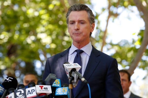 California Governor Gavin Newsom takes a moment to compose his emotions during a news conference regarding the San Jose rail yard shooting in San Jose, Calif., on Wednesday.