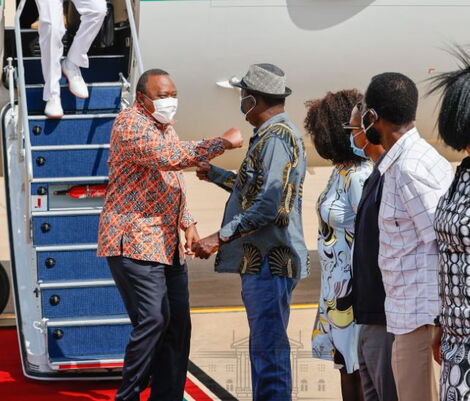 President Uhuru Kenyatta (left) arrived in Kisumu for a three-day working tour of Nyanza Region on May 30, 2021.