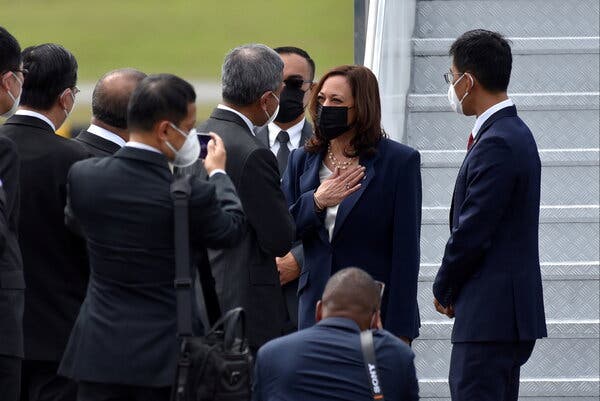 Vice President Kamala Harris was greeted by Foreign Minister Vivian Balakrishnan of Singapore as she arrived in the country on Sunday.