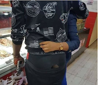 This loved up photo of a couple in a mall is going viral on social media for the wrong reasons- Look at the guy keenly (PHOTO)