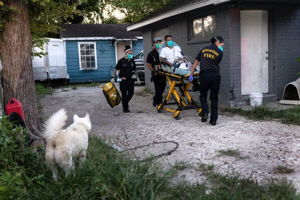 Paramedics transported a man with Covid symptoms to a hospital in Houston, Texas, earlier this week.