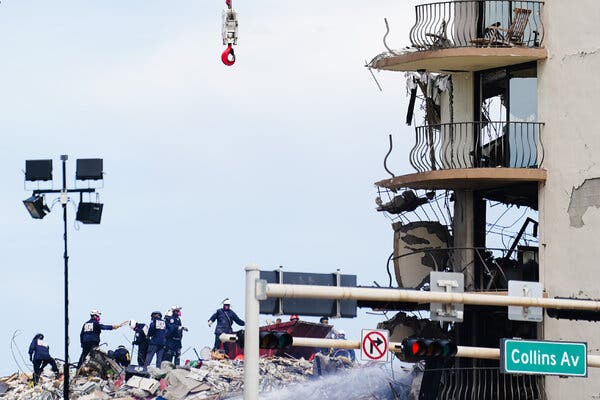Rescue workers searching through the rubble of Champlain South, the partially collapsed building in Surfside, near Miami Beach, Fla., on Saturday.