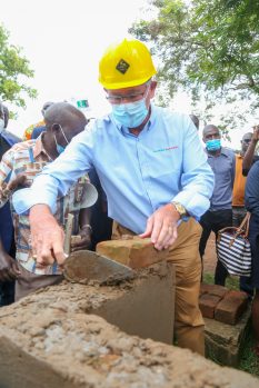 MPESA Foundation Mr. Les Baillie(left)Chief Executive Officer places a brick during the groundbreaking of the Maternity Unit to Ndhiwa Sub County Hospital through the Uzazi Salama Project. Uzazi Salama is a two-year program that aims to promote access to quality health services in Homabay County, targeting about 86, 469 women and children under 5 years in Ndhiwa and Sub Sub-Counties. The event was held at Ndhiwa Sub County Hospital Homabay County - Bizna Kenya