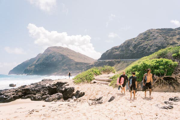 Bodyboarders in Makapu’u, Hawaii, in March. Currently, to visit the islands or move between them, travelers have to show a negative coronavirus test taken within 72 hours.
