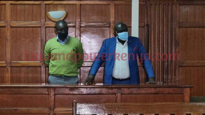 Two charged with fraud over fake gold