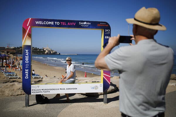 Tourists in Tel Aviv in 2019. That year, according to Tourism Ministry figures, 4.55 million visitors brought Israel $7.18 billion in revenue.