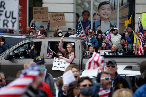 People protesting Pennsylvania’s stay-at-home order last year. Some state legislatures have tried to roll back the emergency powers that governors wielded during the coronavirus pandemic.