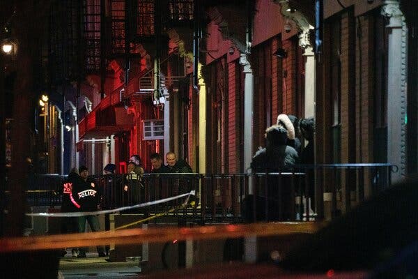 Outside the building in Harlem where two police officers were shot on Friday night.