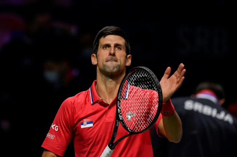 Djokovic 'trying' to get to Australian Open, say teammates