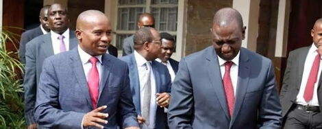 Tharaka Nithi Senator Kindiki Kithure (left) with Deputy President William Ruto (right) after attending a conference in 2019