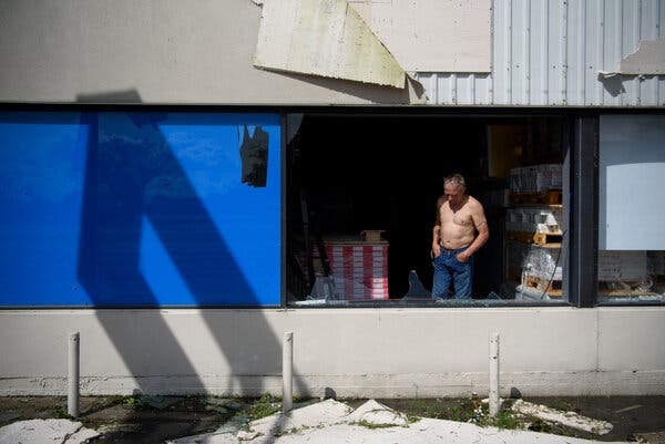 Troy&nbsp;Bonvillian looked at the damage to his flooring business in Houma, La., on Monday.
