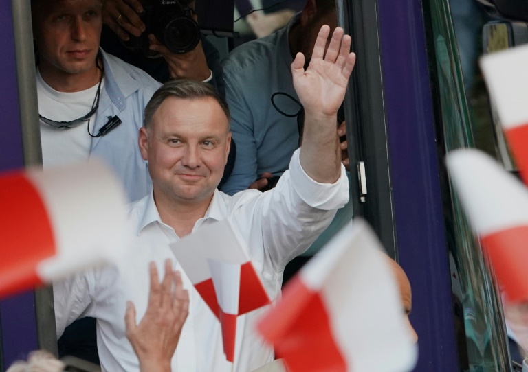 Polarised Poles vote in tight presidential election » Capital News