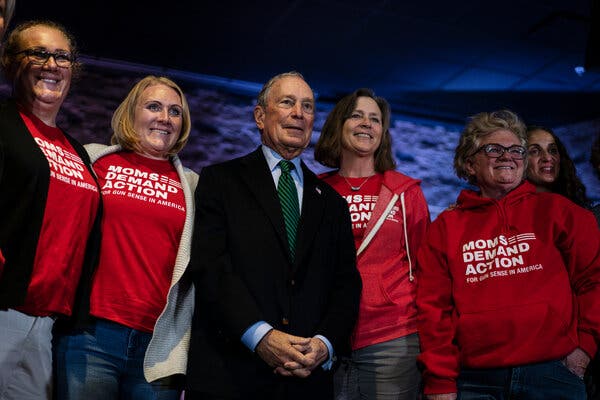 Michael Bloomberg with a gun violence advocacy group, Moms Demand Action, in 2019 in Aurora, Colo. A gun control organization backed by Mr. Bloomberg is running ads to pressure Republican senators to support stronger, expanded background checks for gun buyers