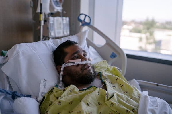 Gilbert Torres, 30, a few hours after being extubated in January, in the intensive care unit of a Los Angeles hospital.