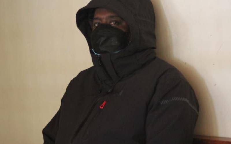 Man held over terrorism link to remain in custody
