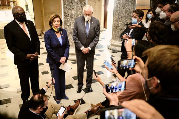 Speaker Nancy Pelosi with two Democratic colleagues, Representative  James Clyburn of South Carolina, left, and Steny H. Hoyer of Maryland, on Capitol Hill last month.