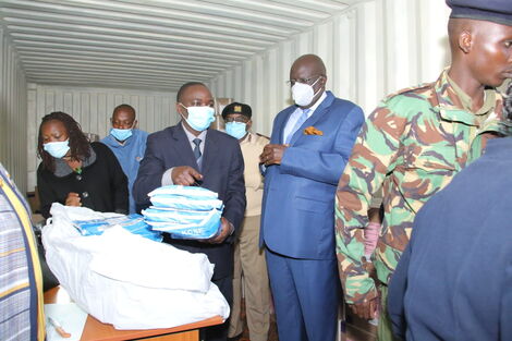 Education CS Prof. George Magoha monitors the day 2 distribution of KCSE 2021 examination materials in Murang'a County on Tuesday, March 15, 2022
