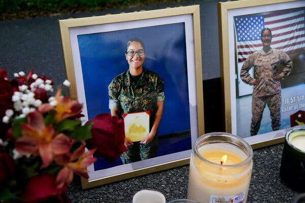 A memorial for Sgt. Johanny Rosario, one of the U.S. Marines killed this week in the bombing at the Kabul airport, at the Marine Corps War Memorial in Arlington, Va., on Sunday.