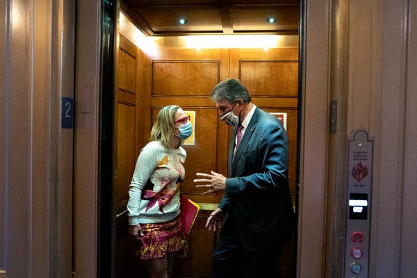 Senator Joe Manchin, right, and Senator Krysten Sinema spoke at the Capitol in Washington earlier this month. The senators are attempting to drum up Republican support for the Capitol riot investigation.