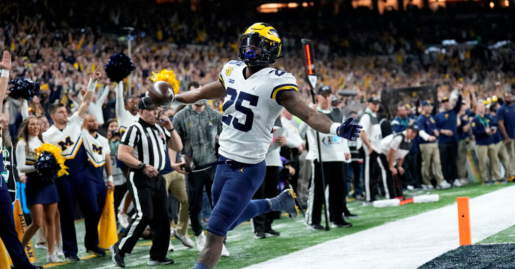 Michigan Rolls to a Playoff Spot With Big Ten Title