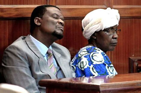 Sirisia MP John Waluke and his co-accused Grace Sarapy Wakhungu appear in court.