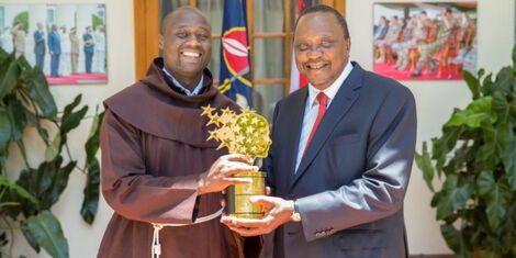 President Uhuru Kenyatta with teacher Peter Mokaya Tabichi, the 2019 Global Teacher Prize winner when he called on him at State House, Nairobi.