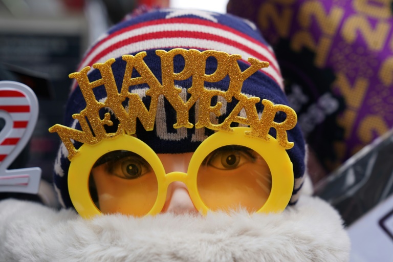 Covid clouds world New Year party » Capital News
