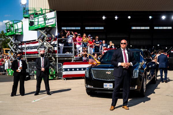 A Secret Service agent on duty while former President Trump held a campaign rally in Oshkosh, Wis., last August.