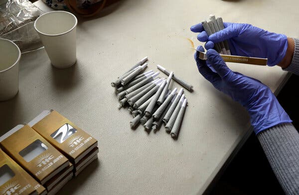 A worker at the Hollingsworth Cannabis Company packaged pre-rolled marijuana joints near Shelton, Wash., in April 2018.