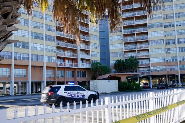 Police patrol outside Crestview Towers, above, which was evacuated Friday, in North Miami Beach, Fla., on Saturday. Another building was evacuated in Miami Beach on Saturday.