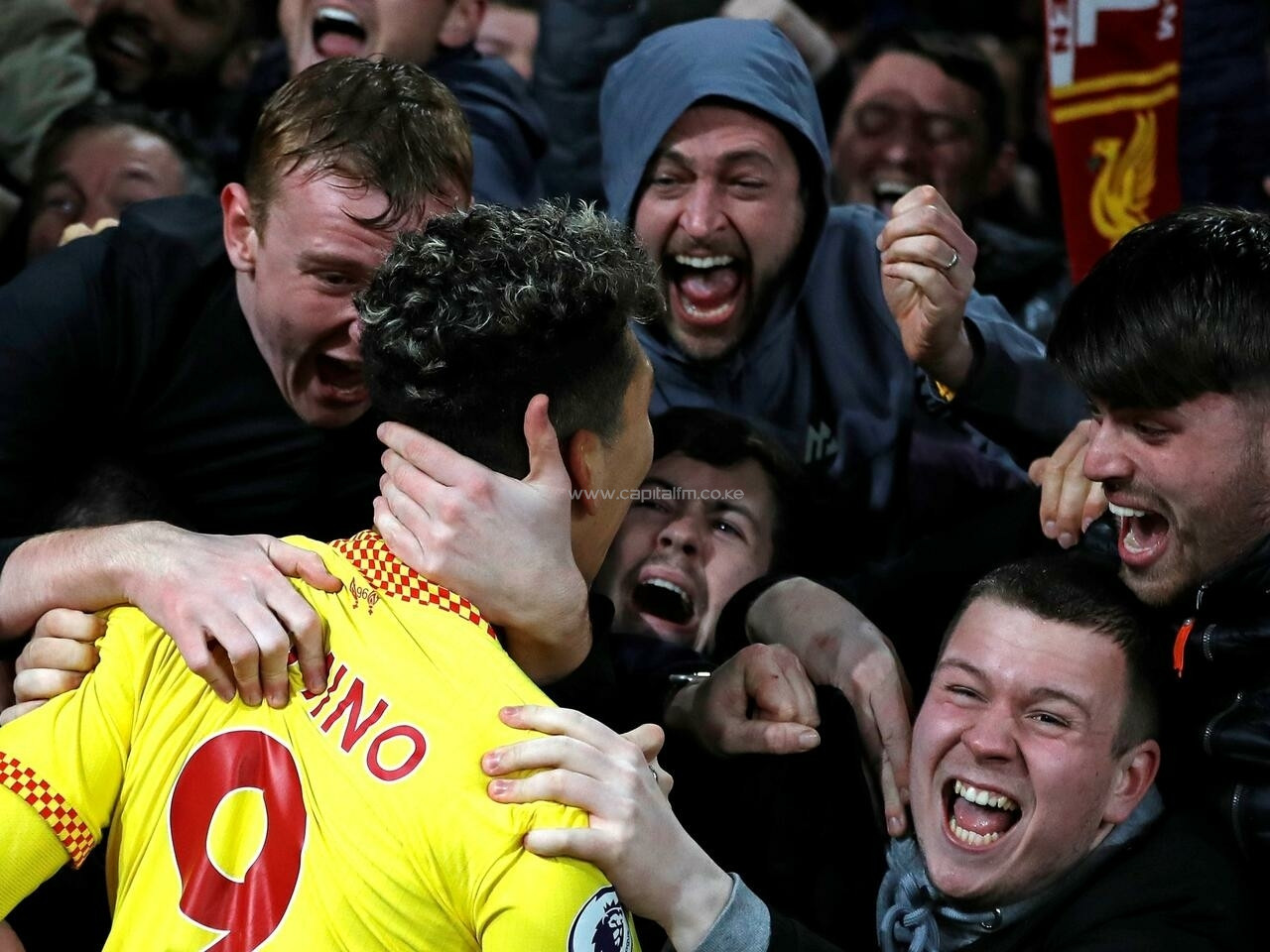 Liverpool sink Arsenal to boost title bid, record-breaker Kane lifts Spurs
