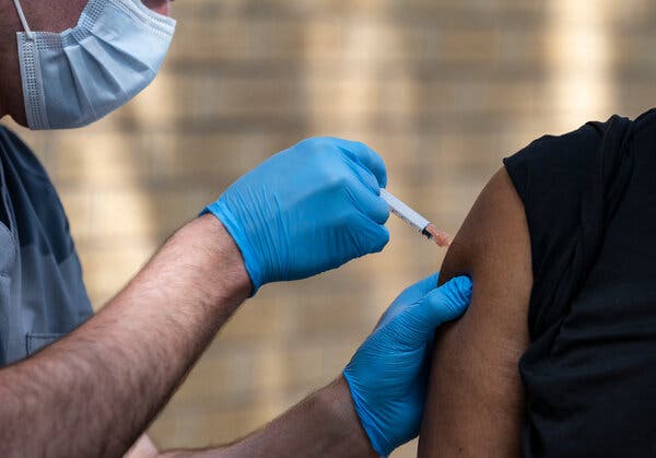Many companies were already moving toward vaccine mandates, but they were focused on white-collar workers.