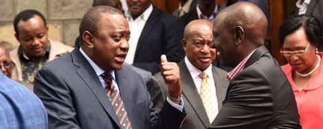 President Uhuru Kenyatta (left) with Deputy President William Ruto (right) at the All Saints Cathedral, Nairobi in 2019