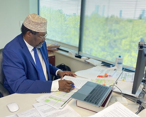 A Photo of Miguna Miguna in His Office in Canada.