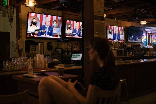 President Biden’s address to a joint session of Congress was on the screens at The Brig, a beer garden in in Washington, on Wednesday night.